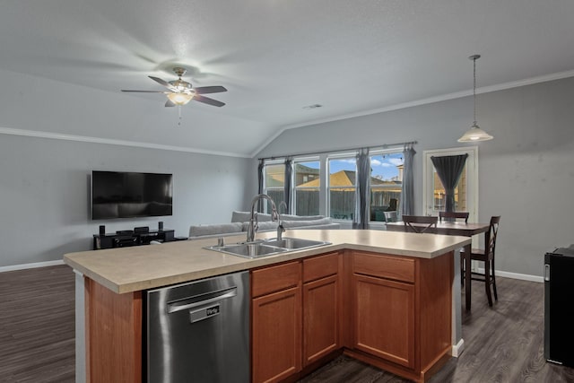 kitchen featuring pendant lighting, sink, stainless steel dishwasher, and a center island with sink