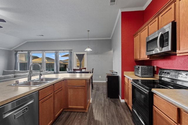 kitchen with dark hardwood / wood-style floors, pendant lighting, sink, black appliances, and crown molding