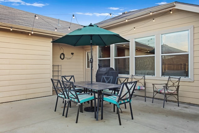 view of patio featuring a grill