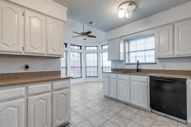 kitchen with white cabinetry and dishwashing machine