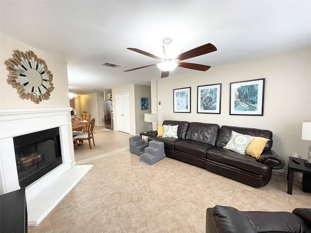 living room featuring ceiling fan