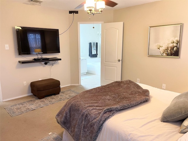 carpeted bedroom with ensuite bathroom