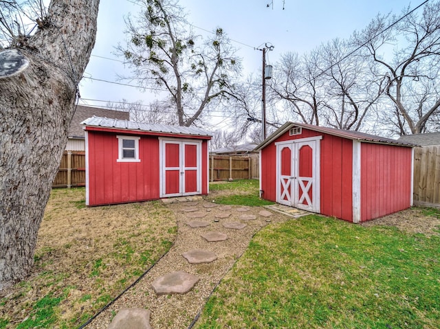 view of outdoor structure with a yard