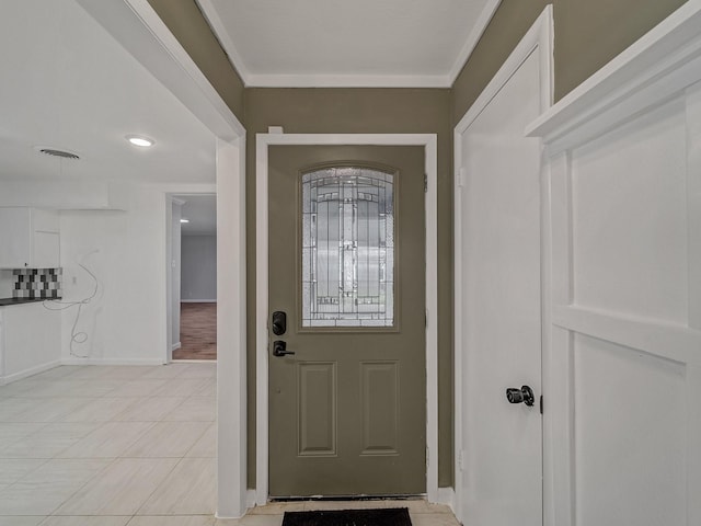 foyer with crown molding