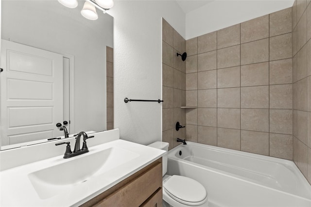 full bathroom featuring  shower combination, vanity, and toilet