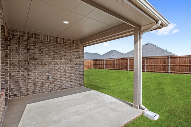 view of patio with a fenced backyard