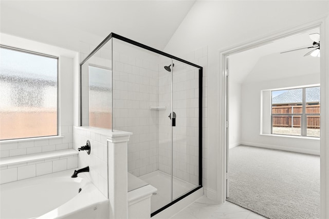 full bathroom featuring marble finish floor, a shower stall, vaulted ceiling, and a bath