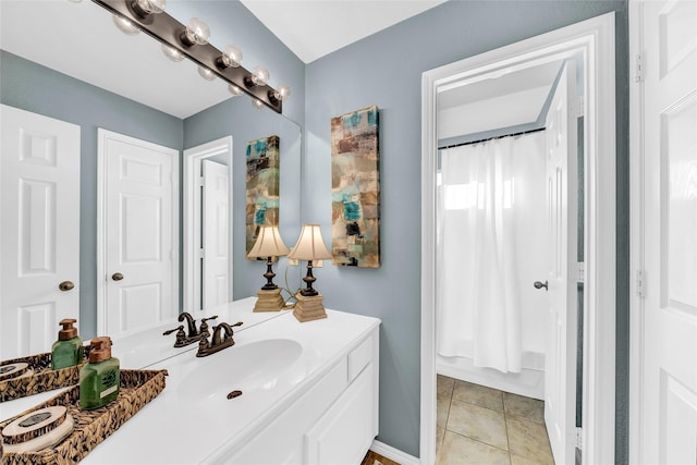 bathroom featuring tile patterned floors, vanity, and shower / bath combo