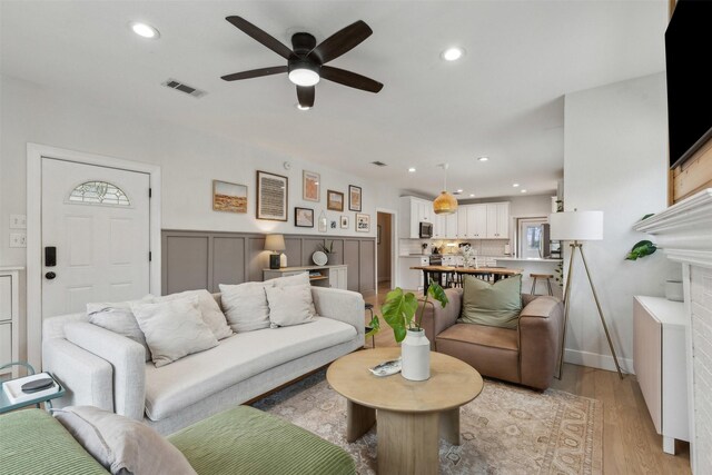 foyer entrance featuring a healthy amount of sunlight and light hardwood / wood-style floors