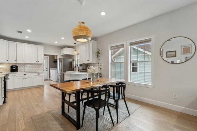 dining area featuring light hardwood / wood-style floors