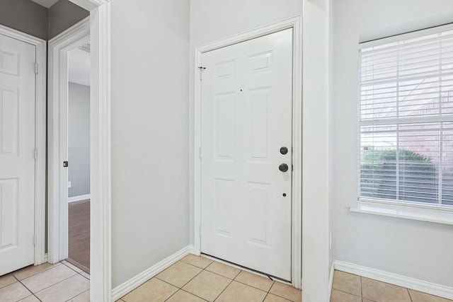 view of tiled foyer entrance