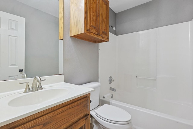 full bathroom with vanity, shower / bathtub combination, and toilet