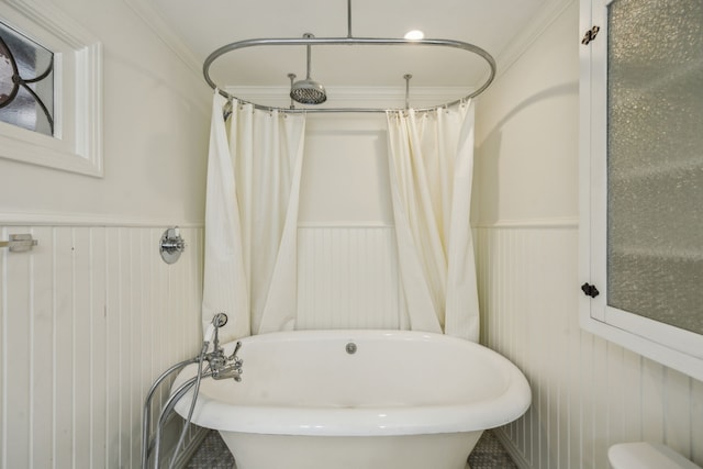 bathroom with shower with separate bathtub and crown molding