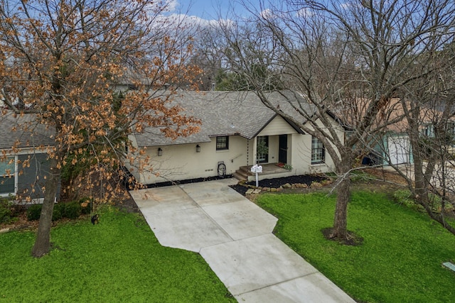 ranch-style house with a front lawn