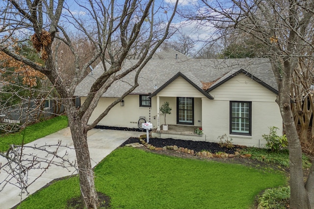 ranch-style house with a front yard