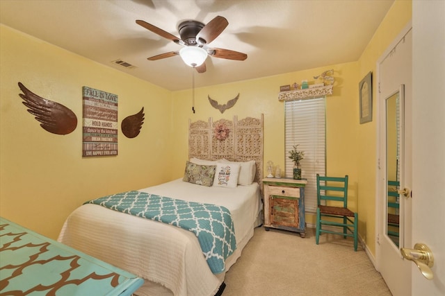 bedroom with light colored carpet and ceiling fan