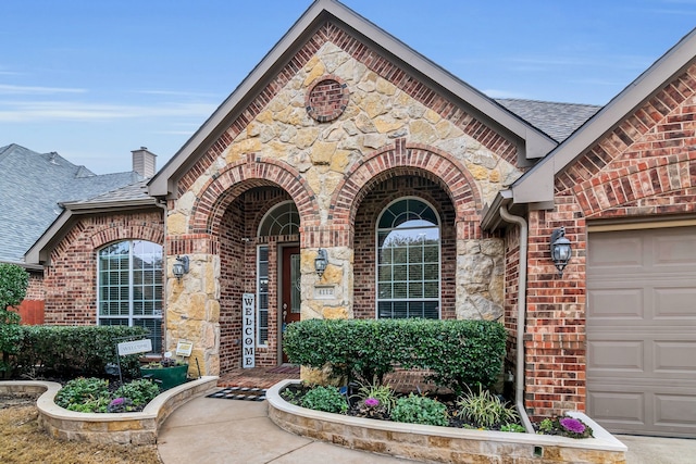 entrance to property with a garage