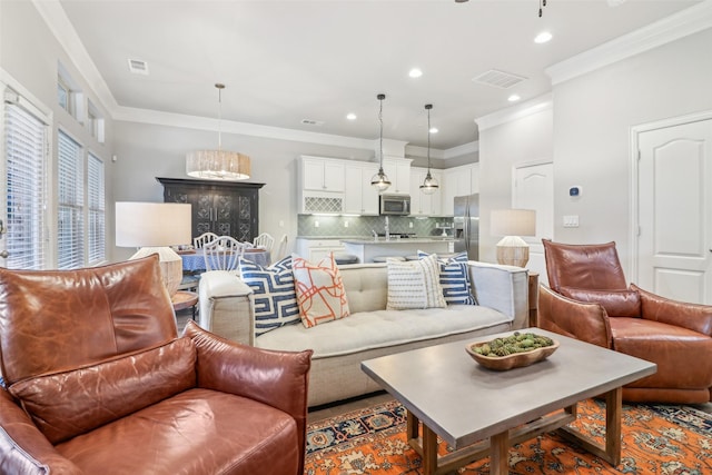 living room featuring ornamental molding