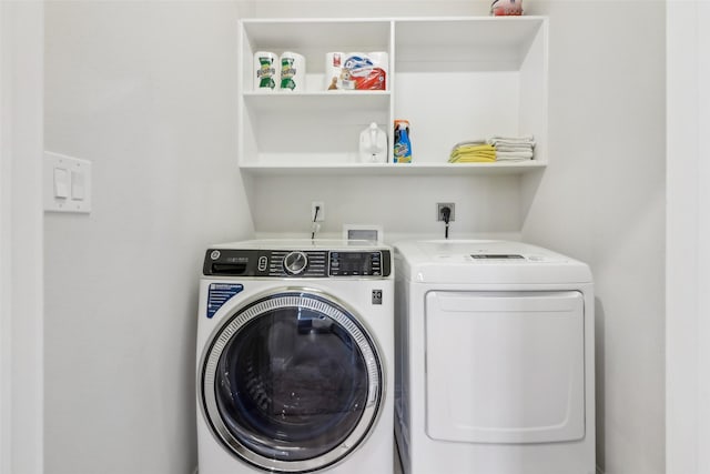 laundry area with washer and clothes dryer