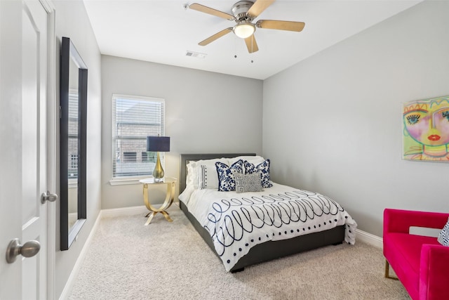 bedroom with ceiling fan and carpet