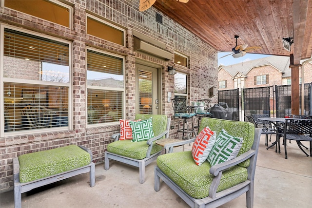 view of patio / terrace featuring ceiling fan