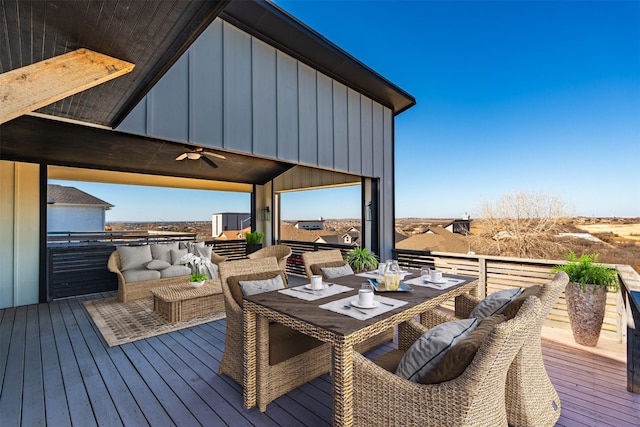 deck featuring an outdoor living space and ceiling fan