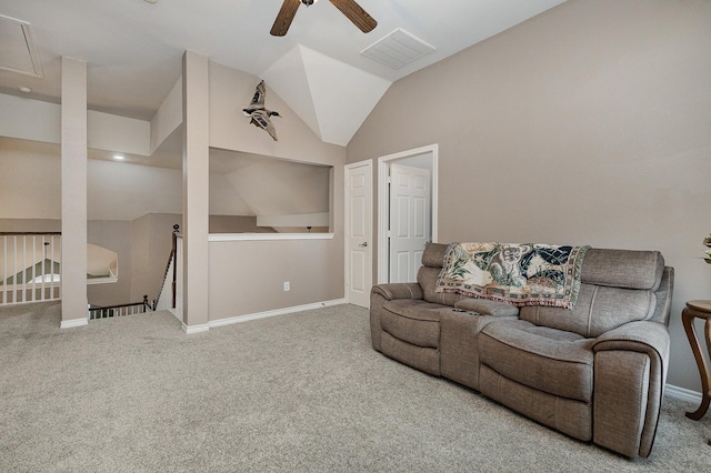 carpeted living room featuring ceiling fan and lofted ceiling