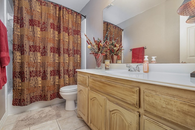 full bathroom featuring tile patterned flooring, vanity, toilet, and shower / bathtub combination with curtain