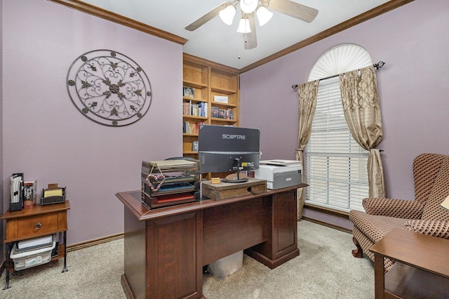 home office with light carpet, crown molding, and ceiling fan