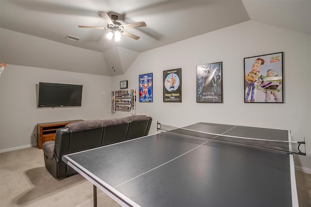 game room with lofted ceiling, light colored carpet, and ceiling fan