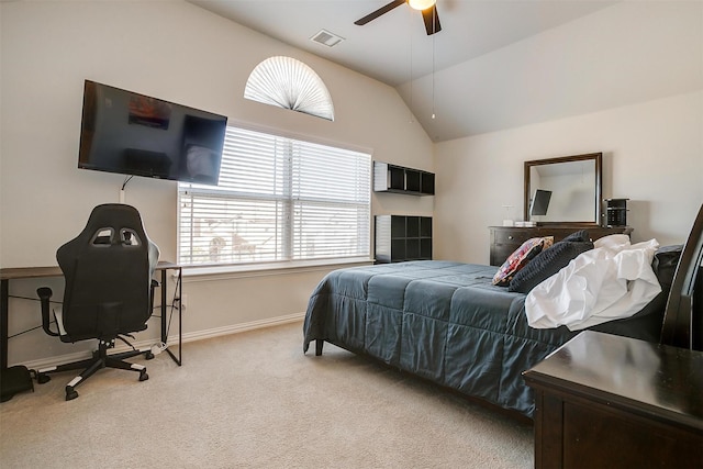 bedroom with lofted ceiling, light carpet, and ceiling fan