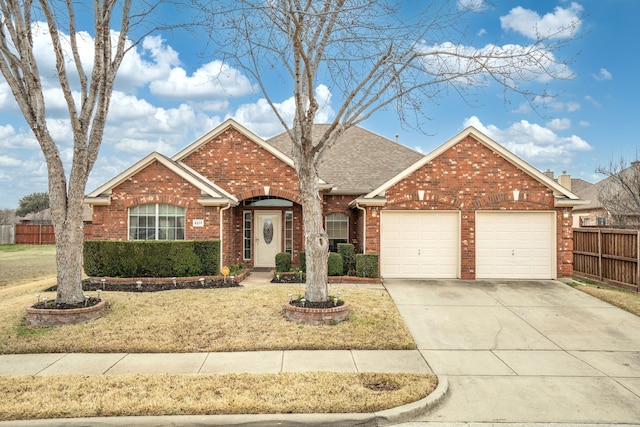 view of front facade with a garage and a front yard