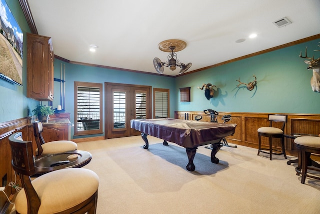 game room with light carpet, crown molding, and pool table