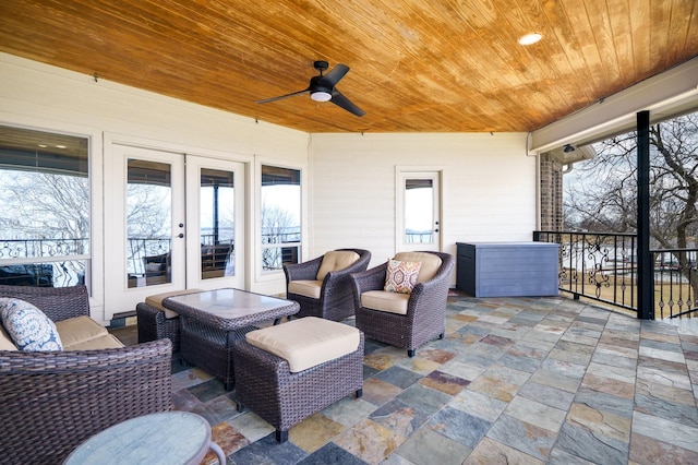 view of patio / terrace featuring outdoor lounge area, french doors, and ceiling fan