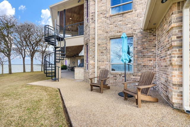 view of patio / terrace featuring a water view