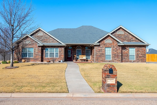 craftsman-style home with a front lawn