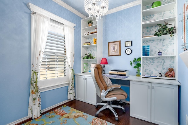 office space featuring crown molding, dark wood-type flooring, and a chandelier