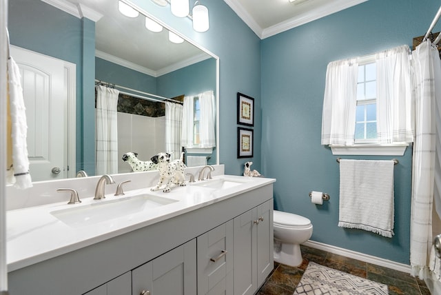 bathroom featuring ornamental molding, curtained shower, vanity, and toilet