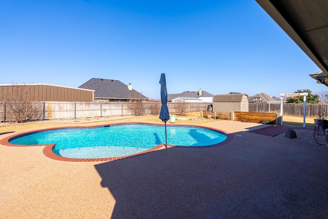 view of pool featuring a patio area