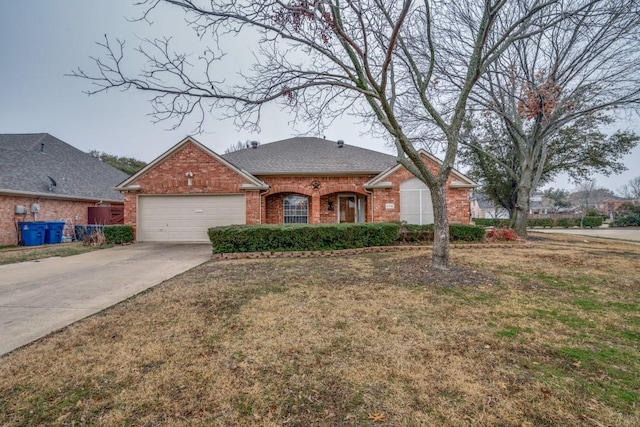 ranch-style home featuring a garage and a front lawn