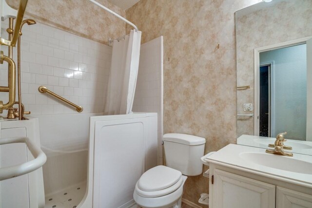 bathroom with vanity, toilet, and a shower with shower curtain