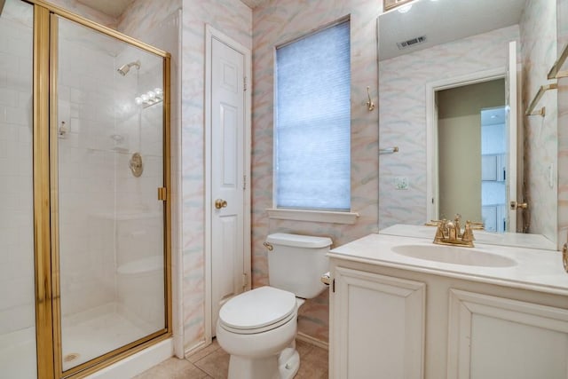 bathroom featuring walk in shower, tile patterned floors, vanity, and toilet