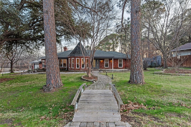 view of front of home with a front yard