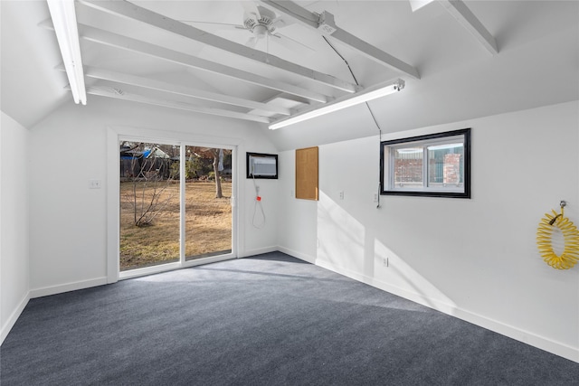 unfurnished room featuring lofted ceiling with beams, carpet, and ceiling fan