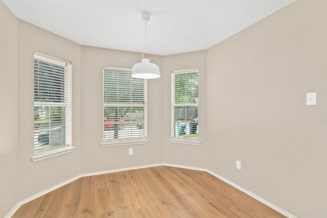 empty room featuring hardwood / wood-style floors