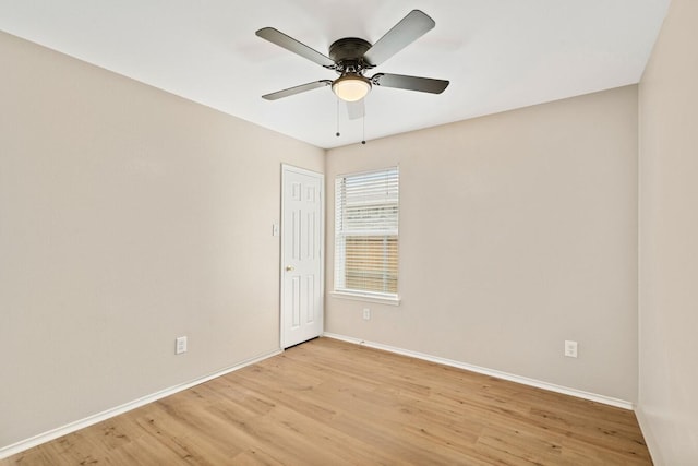 spare room featuring ceiling fan and light hardwood / wood-style floors