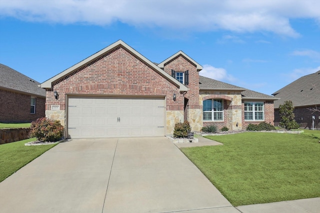 view of front facade featuring a garage and a front yard