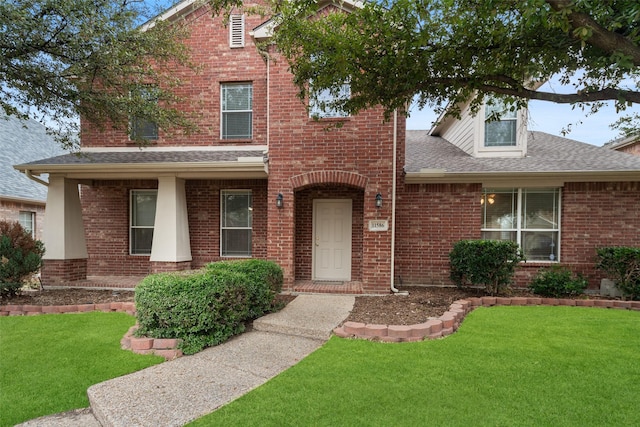 view of front of home with a front yard