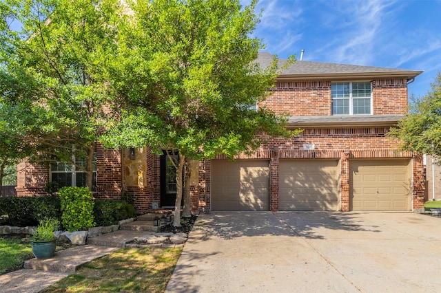 view of front of property with a garage