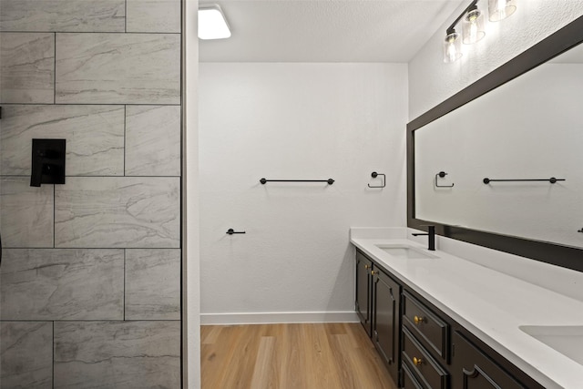 bathroom featuring vanity and hardwood / wood-style flooring